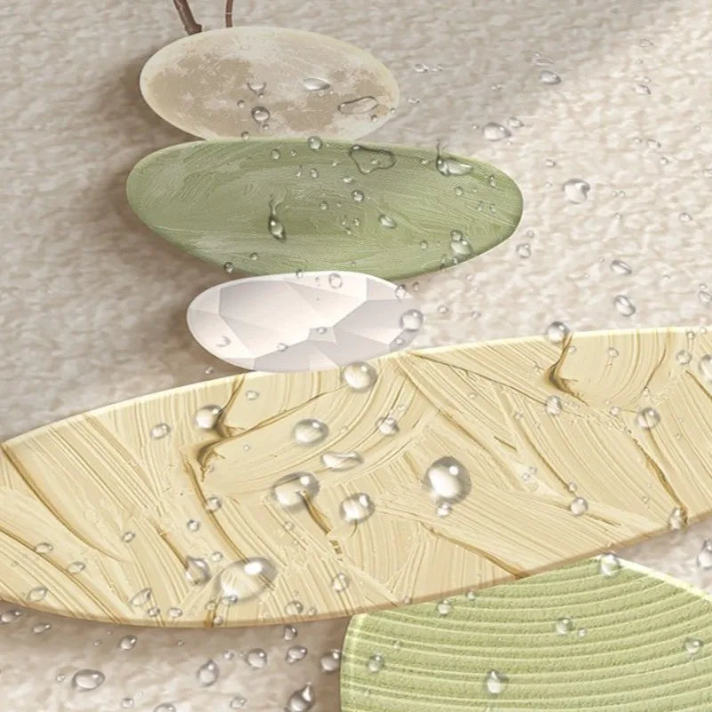 Close-up of textured stones with water droplets on a beige background
